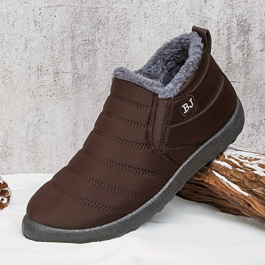 Lined slip-on snow boots with profiled sole for women