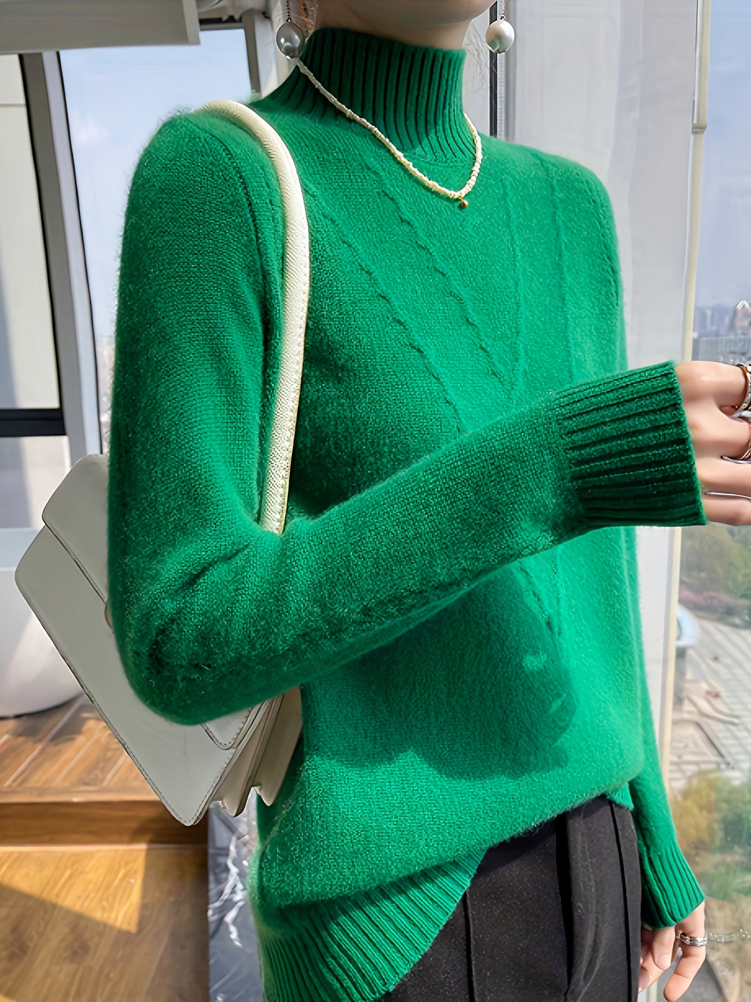 Women's knitted sweater with stand-up collar and textured pattern