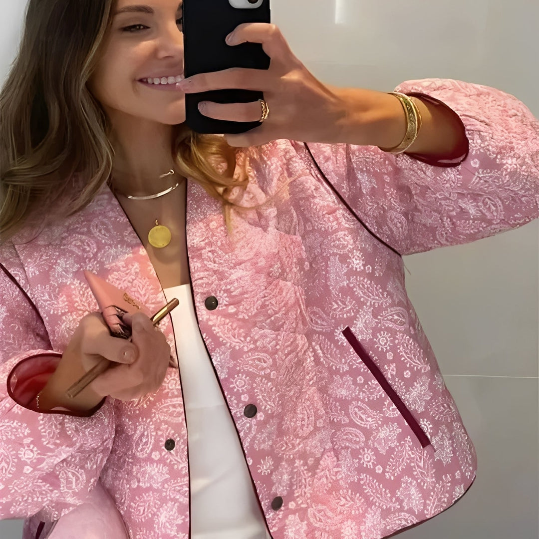 Women's quilted jacket with floral pattern in pink 