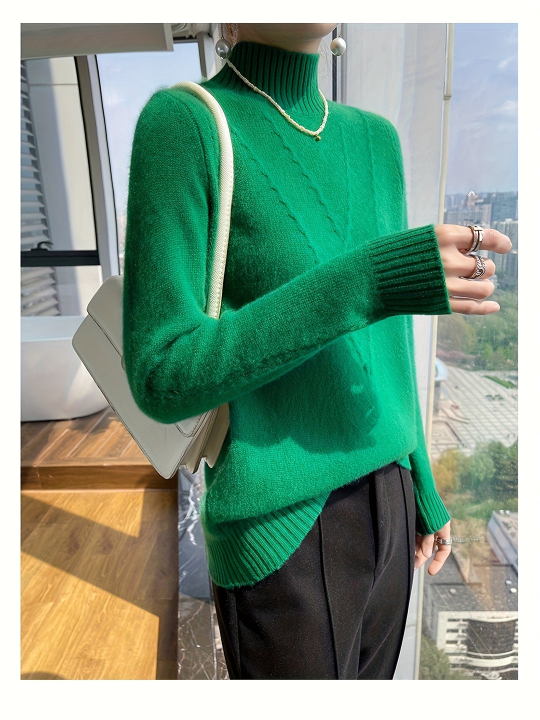 Women's knitted sweater with stand-up collar and textured pattern