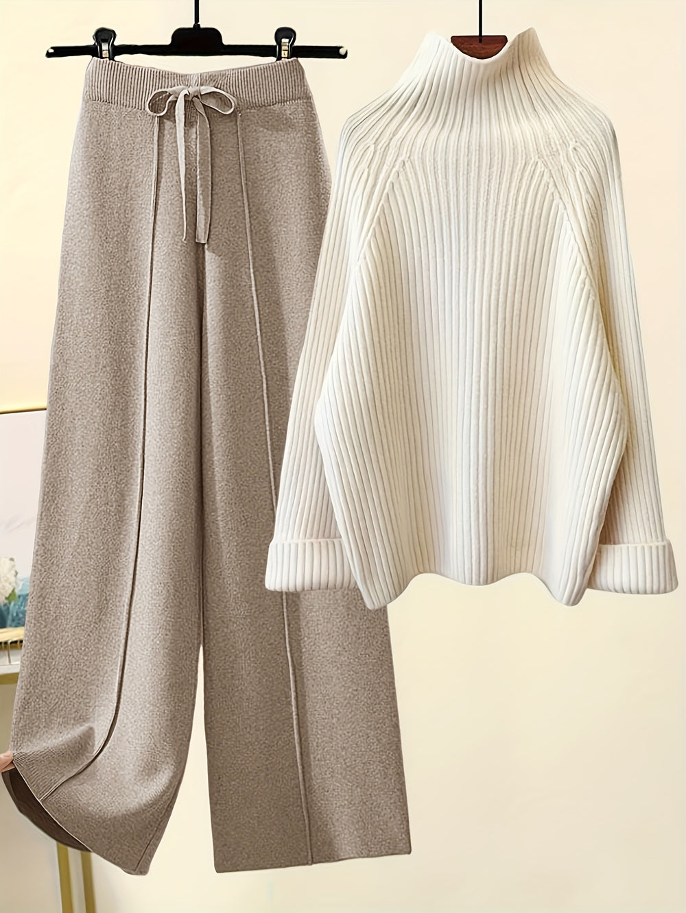 Two-piece knitwear set with turtleneck sweater and trousers for women