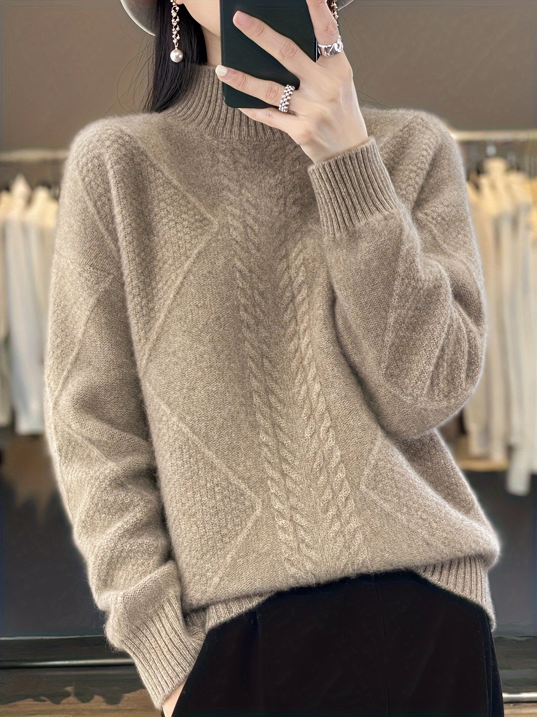 Women's knitted sweater with half stand-up collar and cable knit pattern 