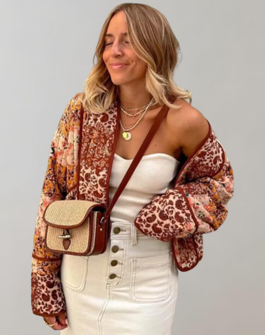 Women's quilted jacket with long flared sleeves and patchwork pattern