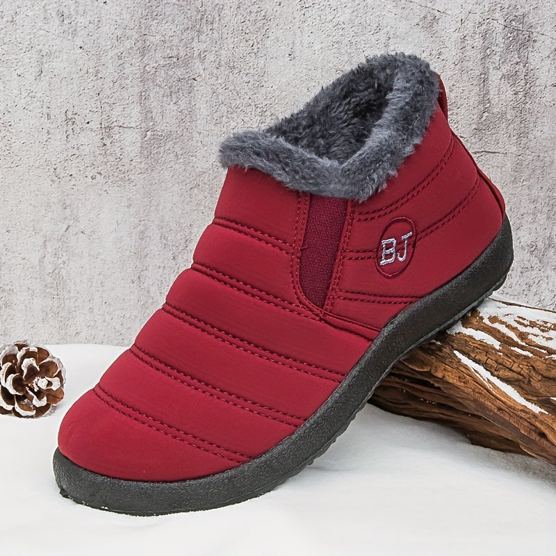 Lined slip-on snow boots with profiled sole for women