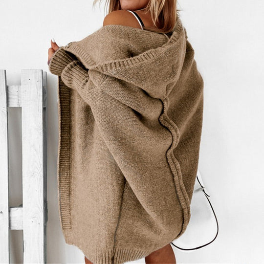 Women's Long Knitted Vest with Hood in an Elegant Design 