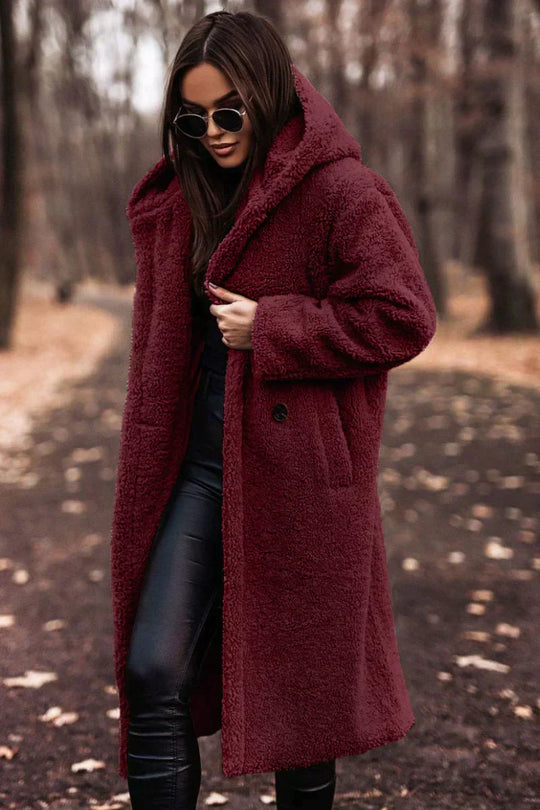 Long women's cozy coat with plush look 