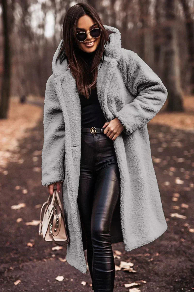 Long women's cozy coat with plush look 