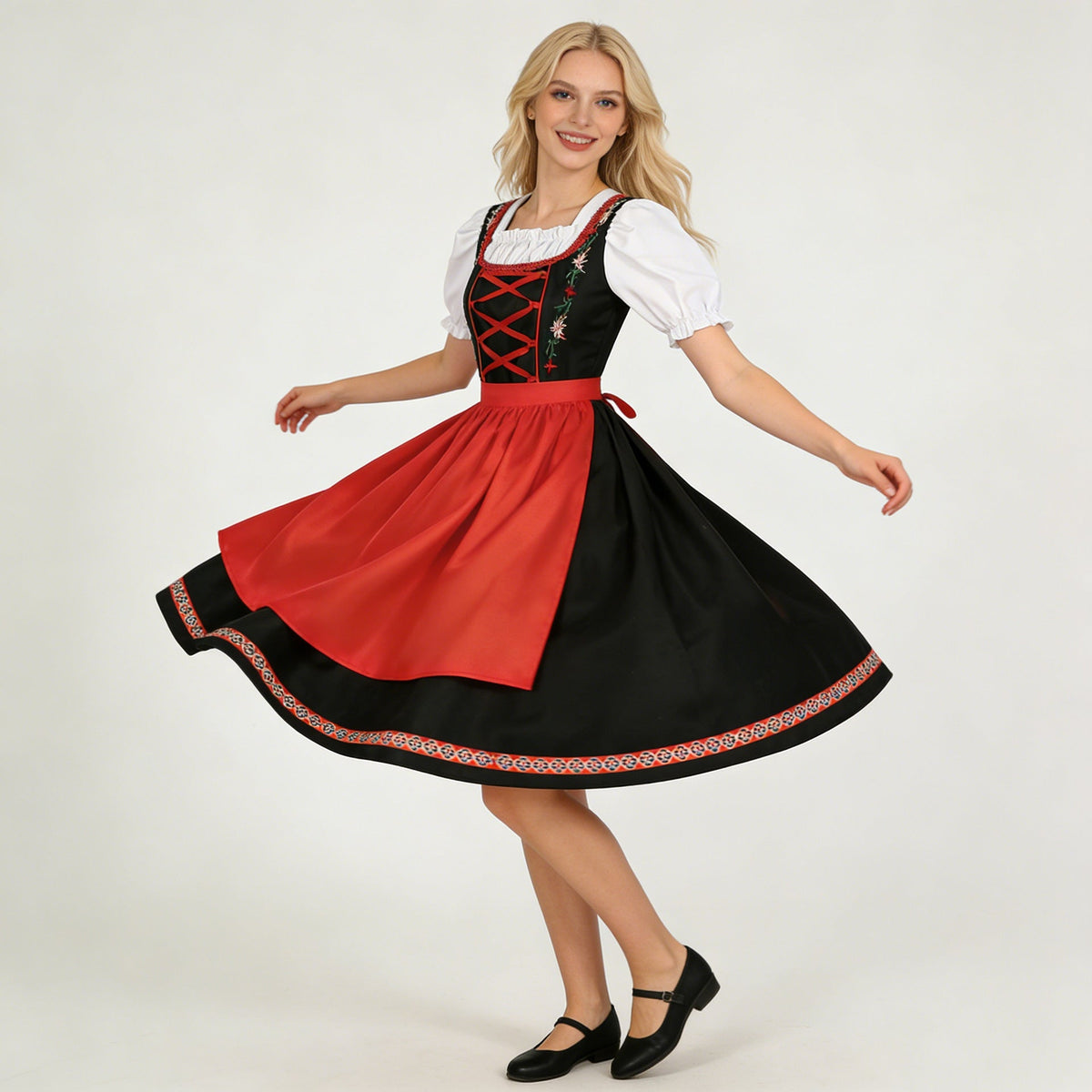 Damen-Dirndl von vorne mit besticktem Mieder und passender Schürze