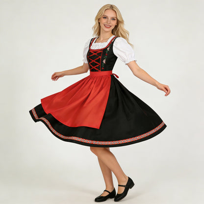 Damen-Dirndl von vorne mit besticktem Mieder und passender Schürze