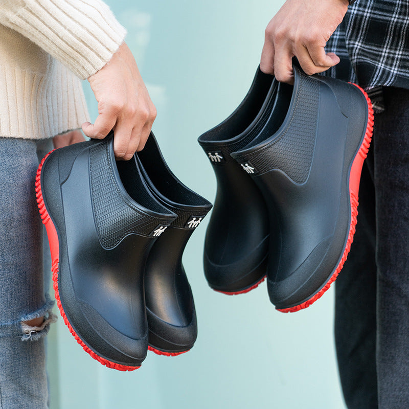 Wasserdichte Herren-Gummistiefeletten mit griffiger Profilsohle von der Seite