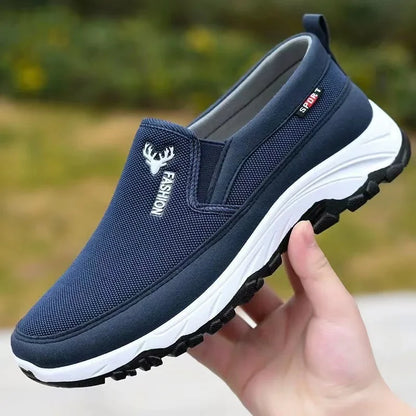Pair of men's slip-on trainers showing lightweight mesh upper and cushioned sole