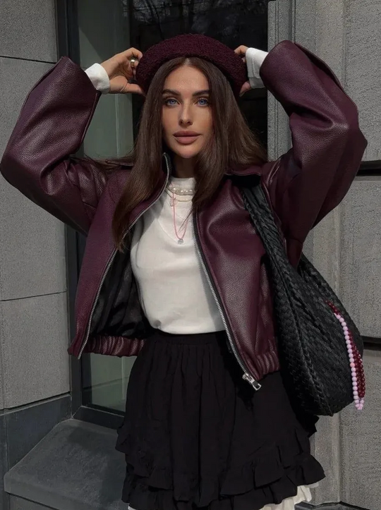 Women's faux leather jacket in burgundy with a short cut