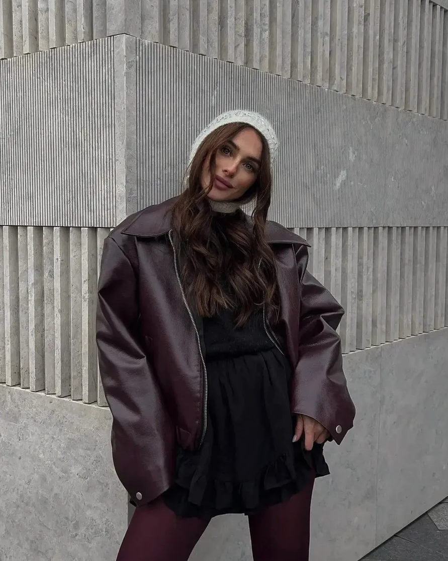 Women's faux leather jacket in burgundy with a short cut