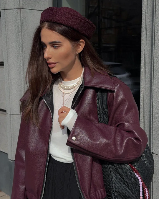 Women's faux leather jacket in burgundy with a short cut