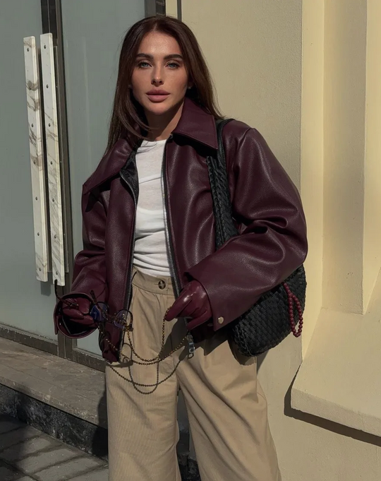 Women's faux leather jacket in burgundy with a short cut