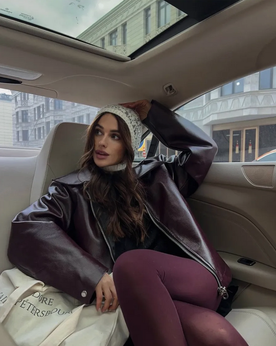 Women's faux leather jacket in burgundy with a short cut