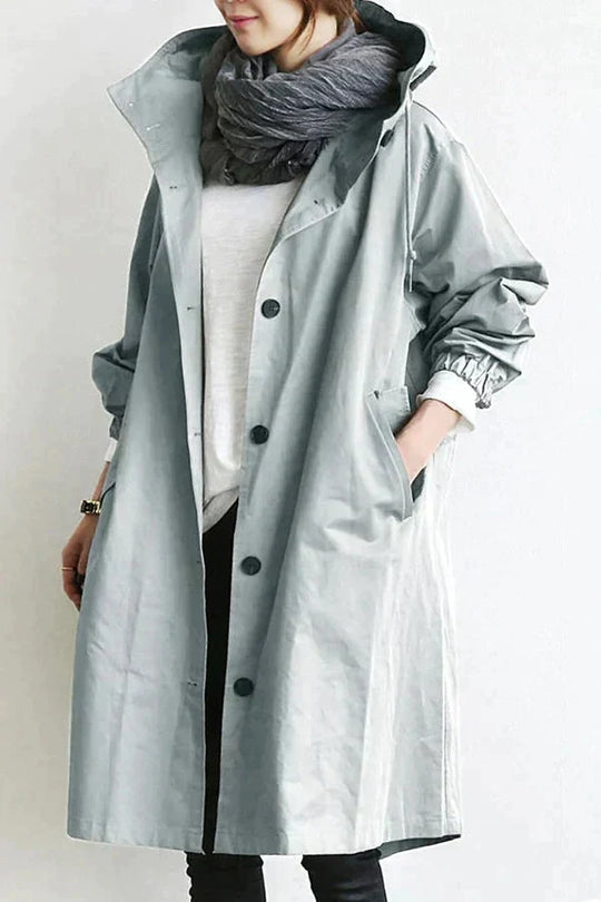 Women's Raincoat with Hood and Oversized Cut