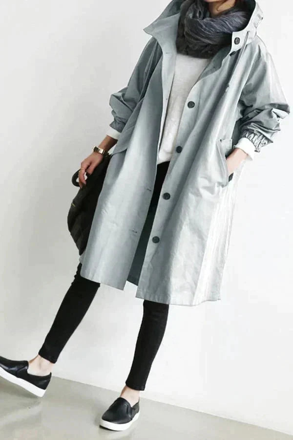 Women's Raincoat with Hood and Oversized Cut