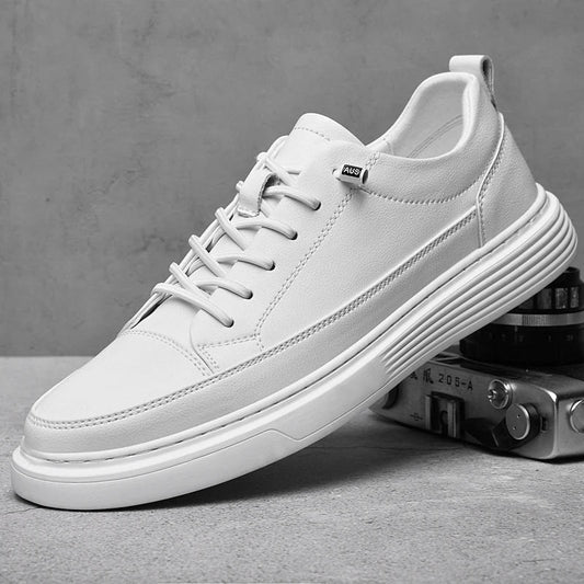 Men's white low-top leather sneakers shown from the side