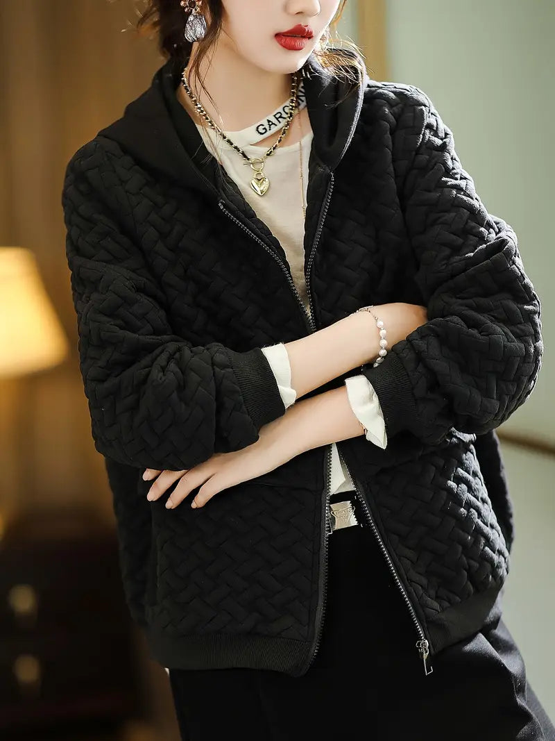 Women's quilted jacket with hood and textured pattern