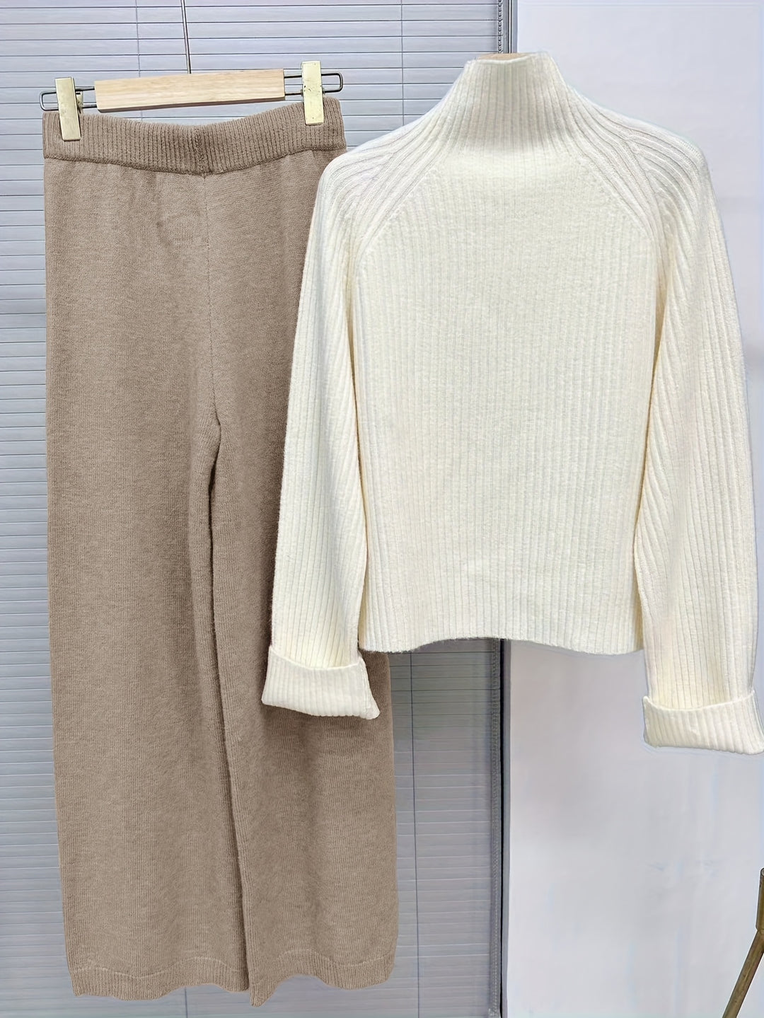 Two-piece knitwear set with turtleneck sweater and trousers for women