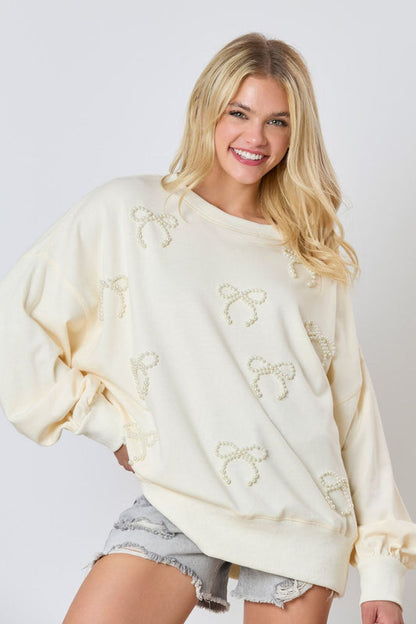 Damenpullover Mit Schleife Und Perlendetail