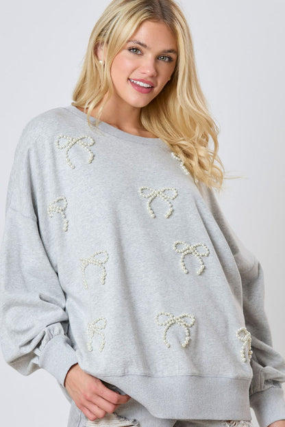 Damenpullover Mit Schleife Und Perlendetail