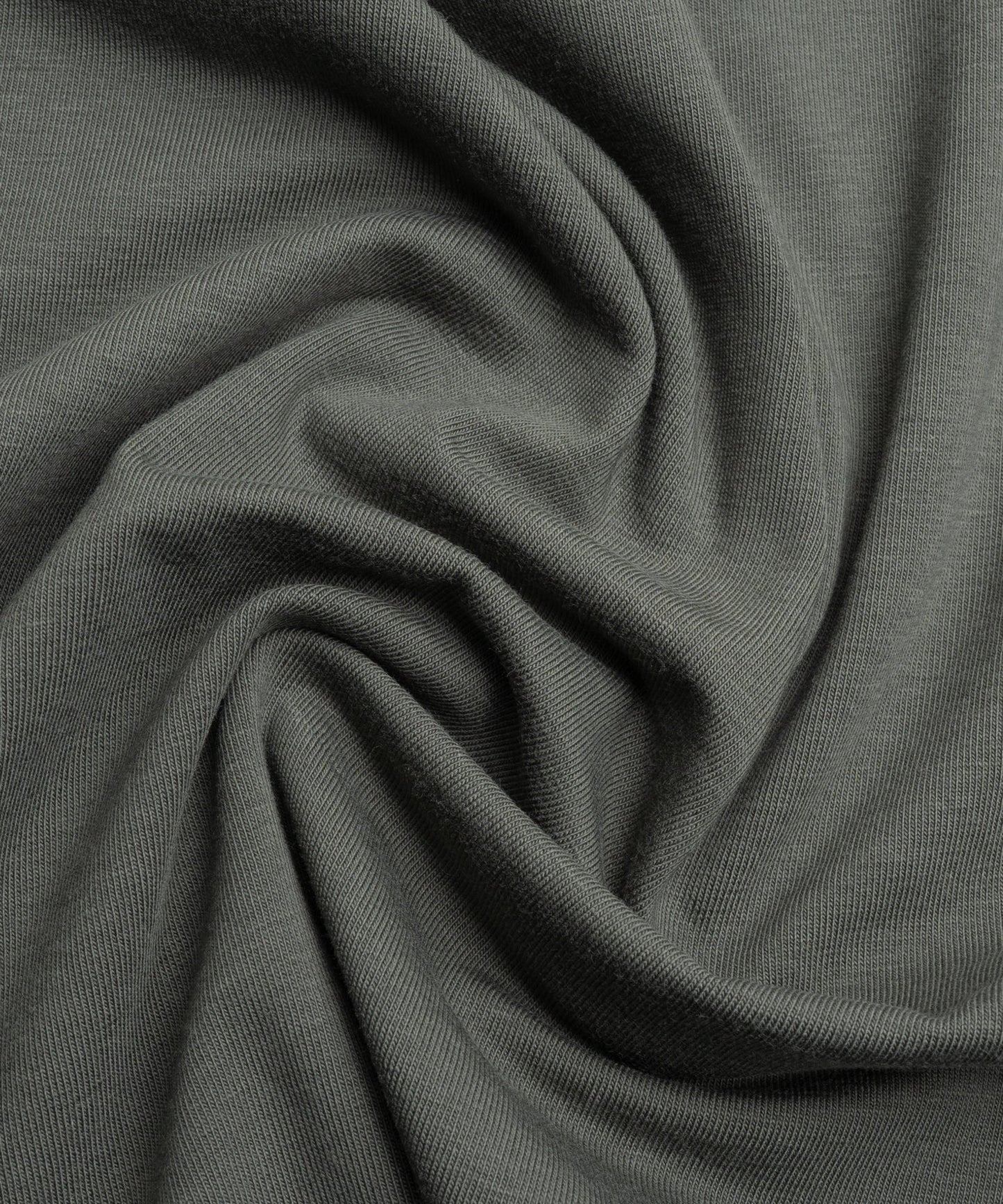 Detail of fabric and fit on the men's classic collar polo shirt