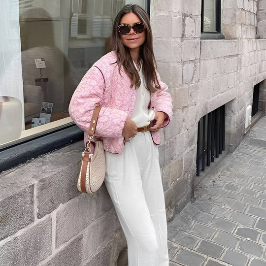 Women's quilted jacket with floral pattern in pink 