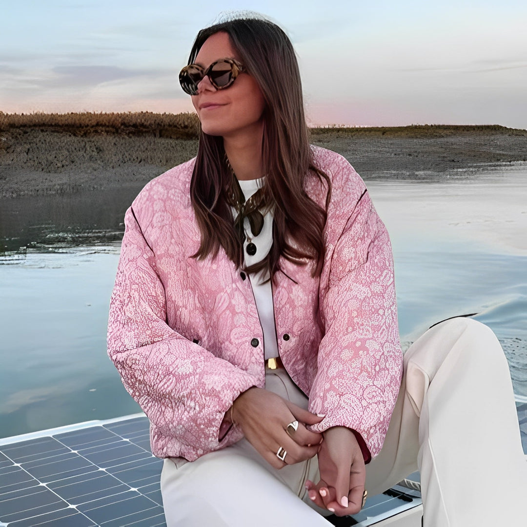 Women's quilted jacket with floral pattern in pink 